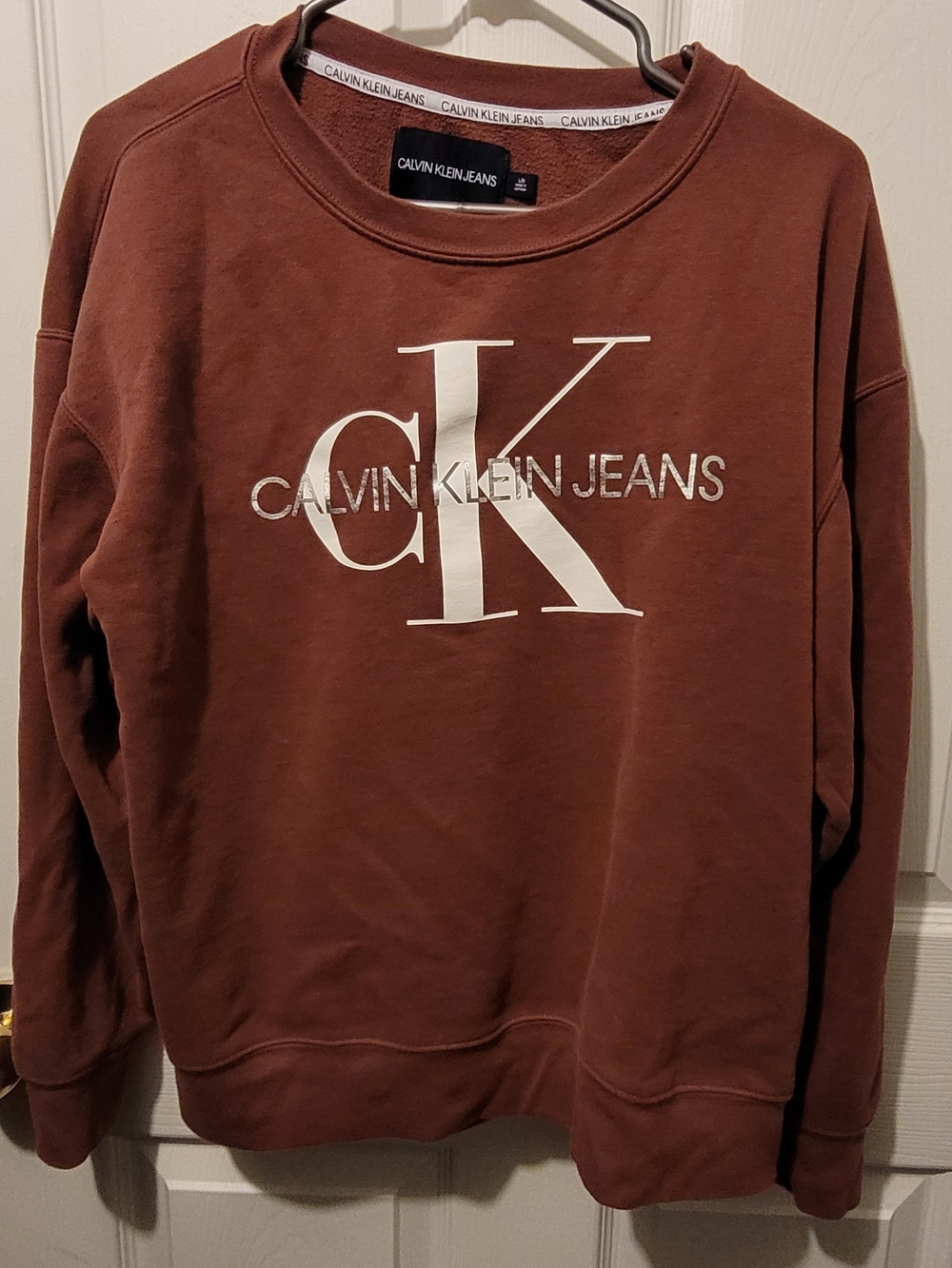 Calvin Klein Jeans Men's Rust Crewneck Sweatshirt with White Logo